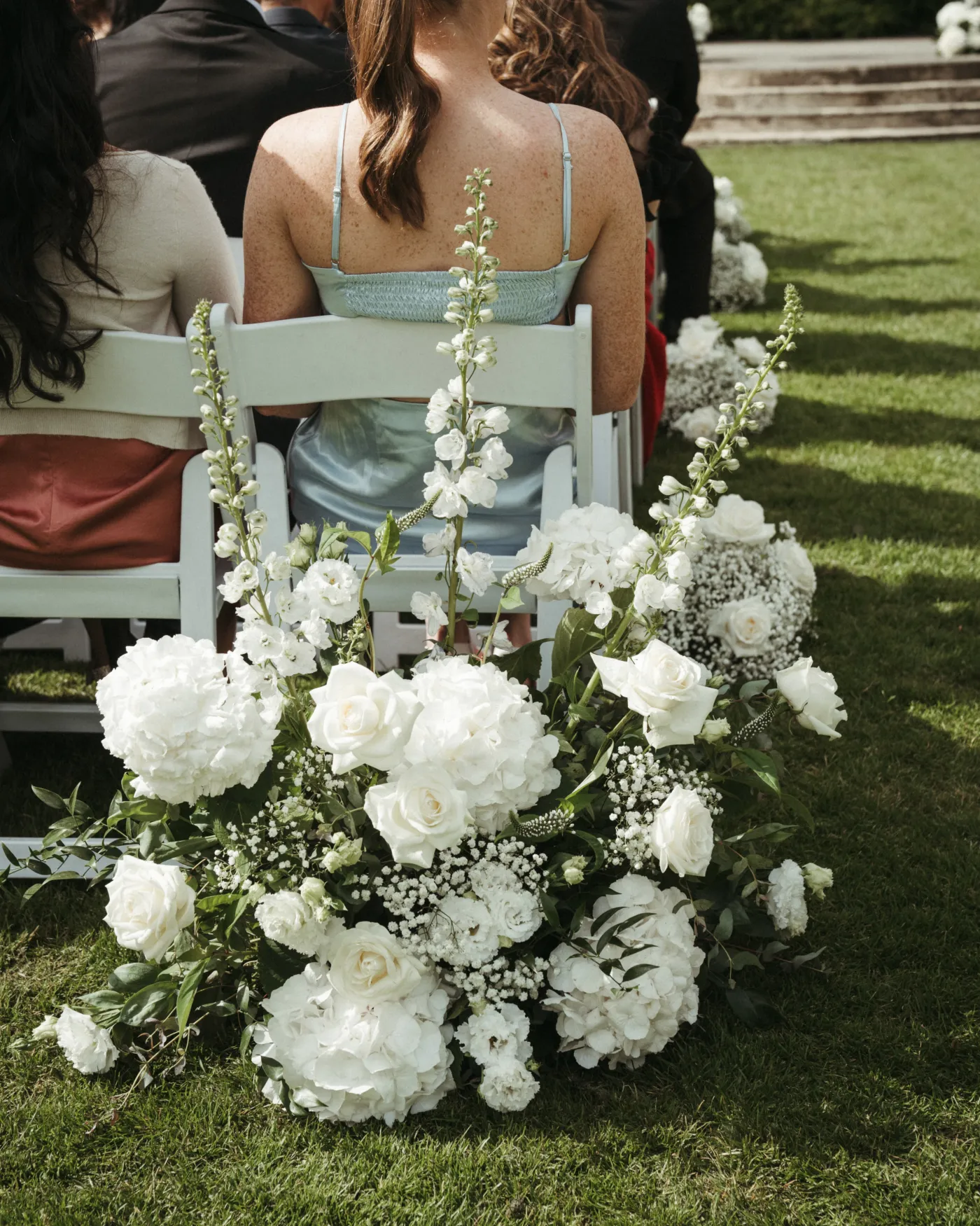 Wedding ceremony meadow flower arrangement